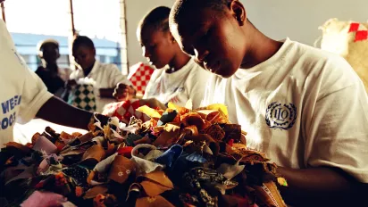 Child workers that have been withdrawn from domestic service work at a desk